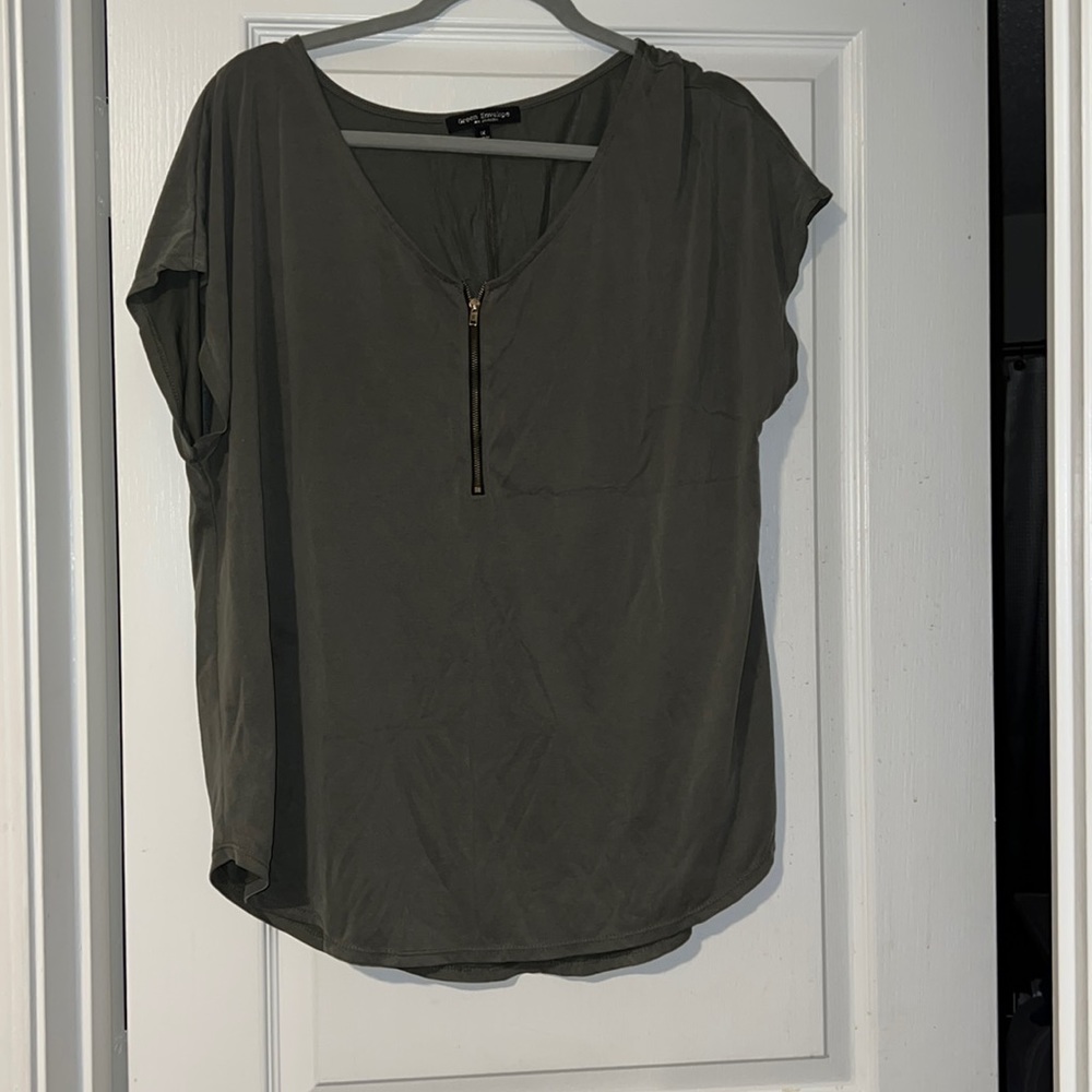 olive green shirt, cute zipper infront of the shirt